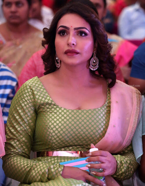 Nandini Rai low neck dress busty big boobs show in pre-release, Bolly Tube