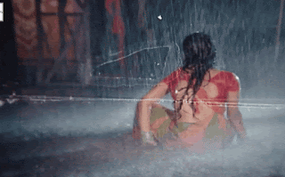 Rubel wet red saree navel